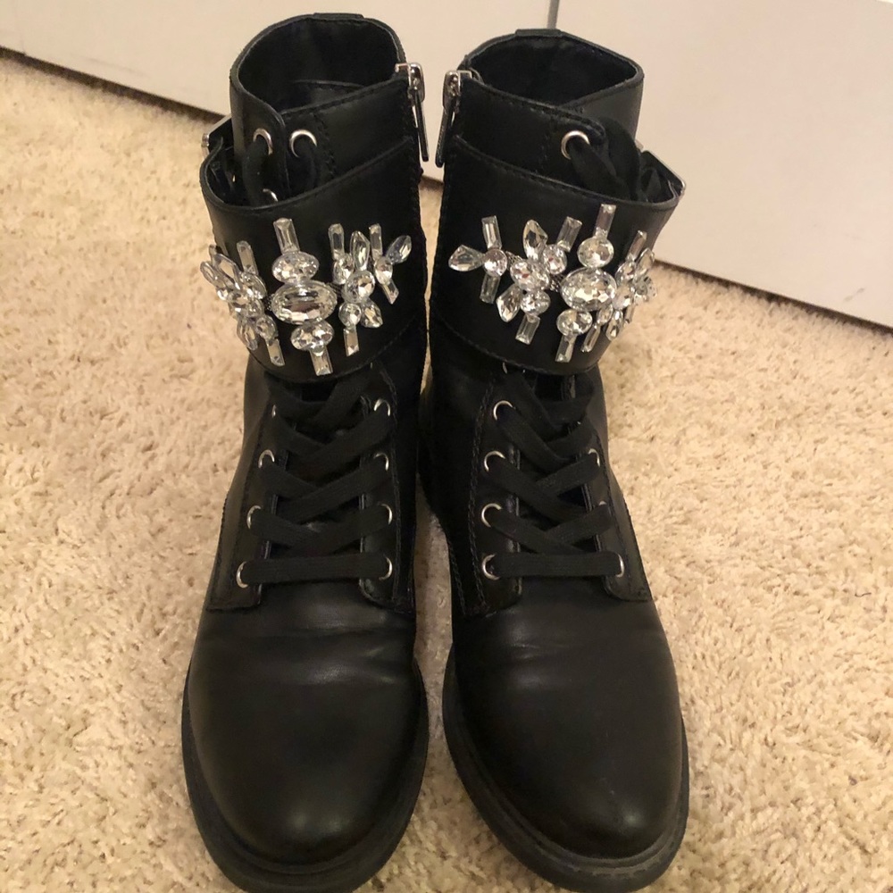 Black embellished combat boots